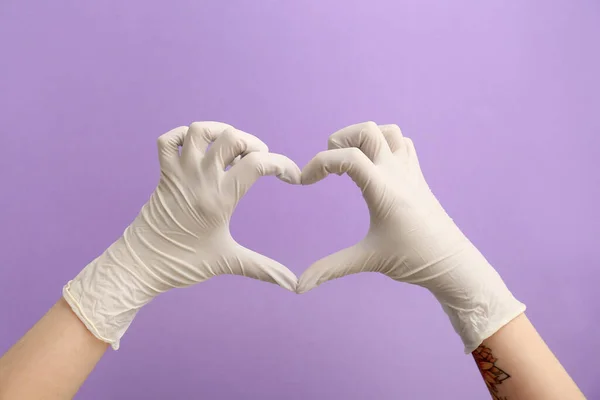 Female Doctor Medical Gloves Making Heart Shape Her Hands Violet — Stock Photo, Image