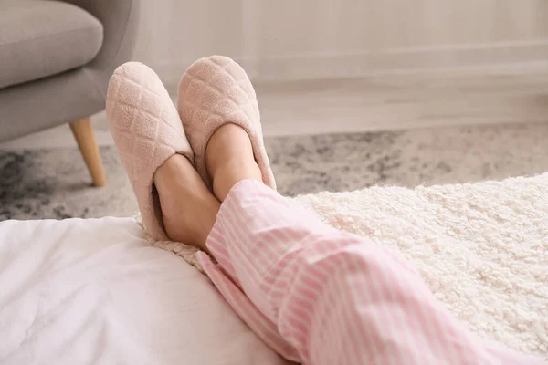 Young Woman Soft Comfortable Slippers Lying Bed — Stock Photo, Image
