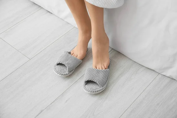 Young Woman Putting Soft Comfortable Slippers Bedroom — Stock Photo, Image