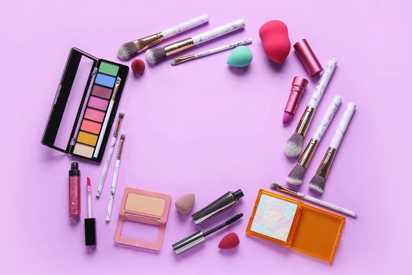 Marco Hecho Diferentes Productos Maquillaje Sobre Fondo Púrpura — Foto de Stock