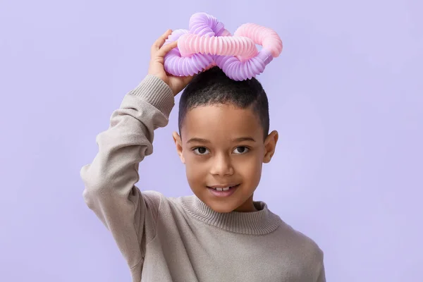 Little African American Boy Pink Pop Tube Lilac Background — Stock Photo, Image