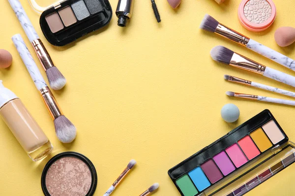 Frame Made Decorative Cosmetics Makeup Brushes Yellow Background — Stock Photo, Image