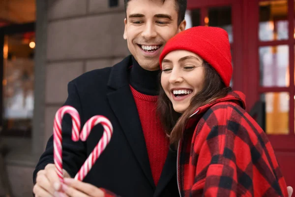 Loving Couple Candy Canes Winter Day — Stock Photo, Image