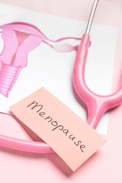Papers Word Menopause Uterus Stethoscope Pink Background Closeup — Stock Photo, Image