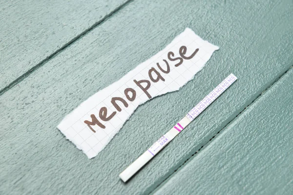 Paper Piece Word Menopause Pregnancy Test Color Wooden Background — Stock Photo, Image