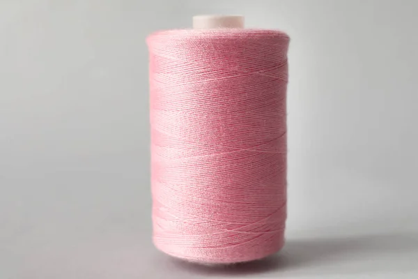 Pink Sewing Thread Spool Light Background — Stock Photo, Image