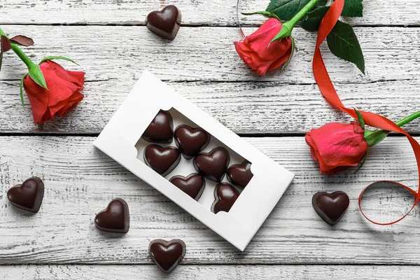 Box Tasty Heart Shaped Candies Flowers Light Wooden Background — Stock Photo, Image