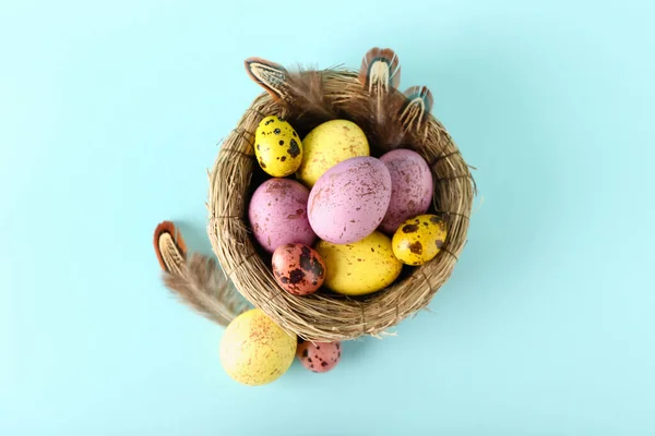 Nest Colorful Easter Eggs Blue Background — Stock Photo, Image