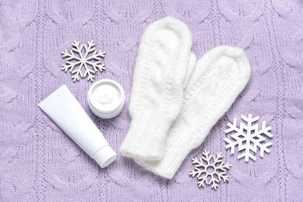 Mittens Cosmetic Products Snowflakes Knitted Fabric Background — Stock Photo, Image