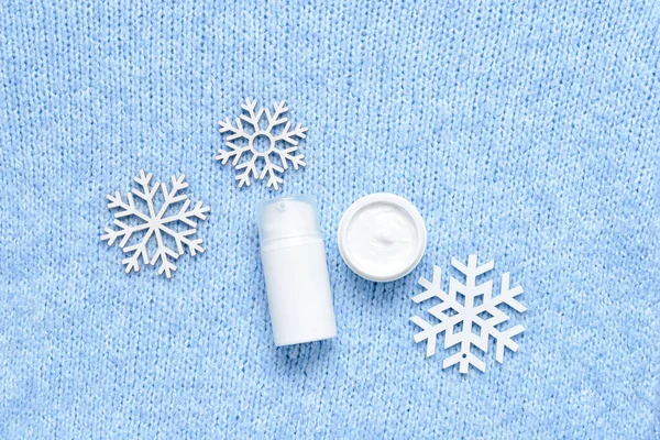 Cosmetic Products Snowflakes Knitted Fabric Background — Stock Photo, Image