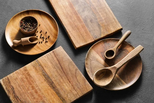 Wooden Cutting Boards Plates Spoons Black Background — Stock Photo, Image