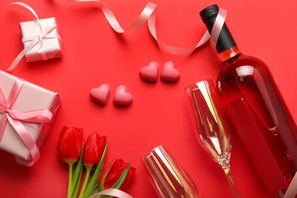Composition Tasty Heart Shaped Candies Flowers Bottle Wine Valentine Day — Stock Photo, Image
