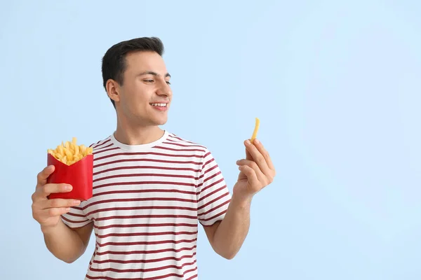 Young Man French Fries Blue Background — Stock Photo, Image