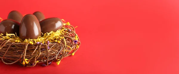 Nest Chocolate Easter Eggs Red Background Space Text Stock Photo