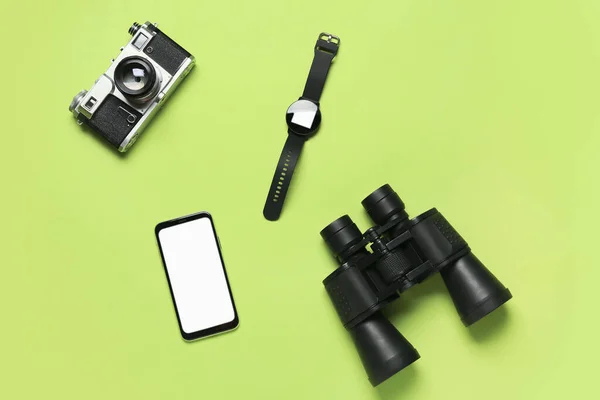 Mobile Phone Binoculars Smart Watch Photo Camera Green Background — Stock Photo, Image