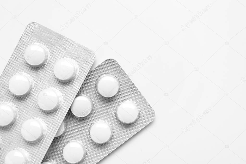 Blister packs with pills isolated on white background, closeup
