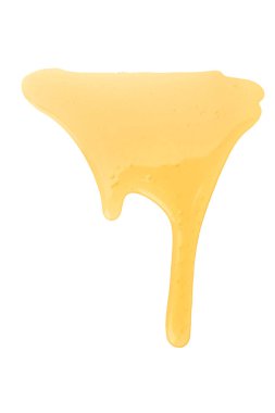 Bal beyaz arkaplana döküldü