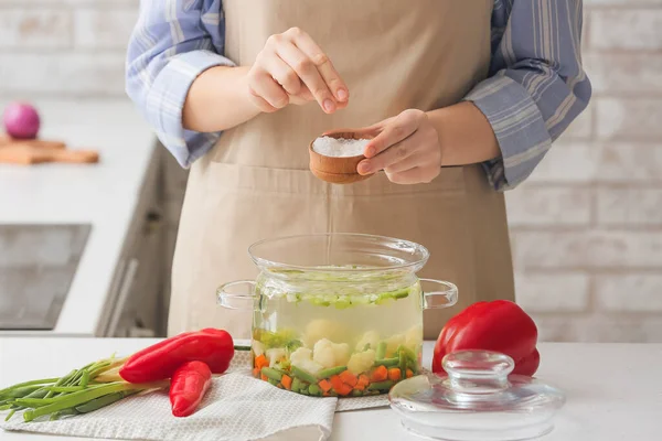 Woman Adding Salt Tasty Dietary Soup Table Kitchen — Stock Photo, Image