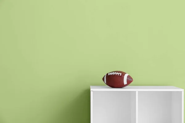 Rugby Ball Shelf Green Wall — Stock Photo, Image