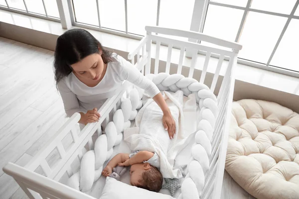 Beautiful Young Woman Her Adorable Baby Sleeping Crib Home — Stock Photo, Image