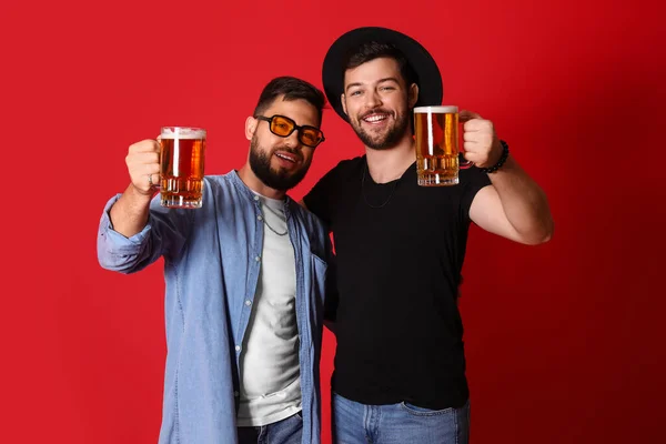 Young Brothers Glasses Beer Red Background — Stock Photo, Image
