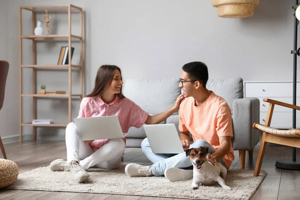 Young Couple Cute Dog Using Laptops Floor Home — Stock Photo, Image