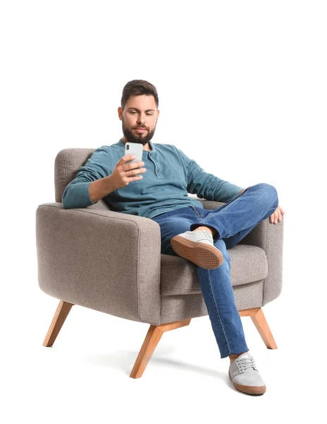 Handsome Bearded Man Using Mobile Phone Grey Armchair White Background — Stock Photo, Image