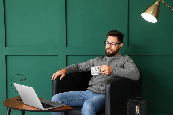 Handsome Bearded Man Cup Hot Beverage Sitting Leather Armchair Green — Stock Photo, Image