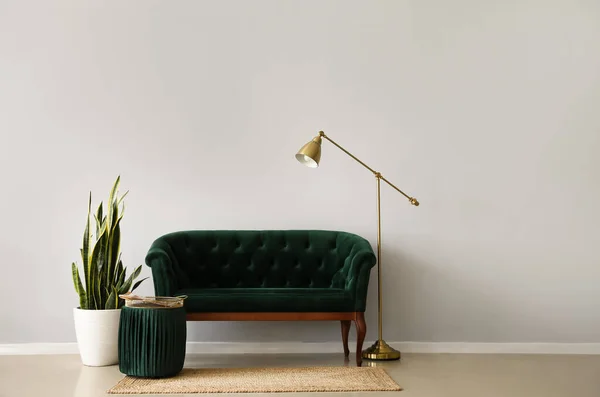 Green Sofa Pouf Houseplant Standing Lamp Light Wall — Stock Photo, Image