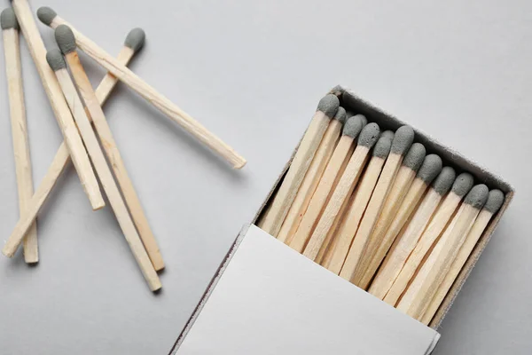 Box New Matchsticks Grey Background Closeup — Stock Photo, Image