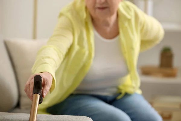 Senior Woman Back Pain Taking Walking Stick Home Closeup — Stock Photo, Image