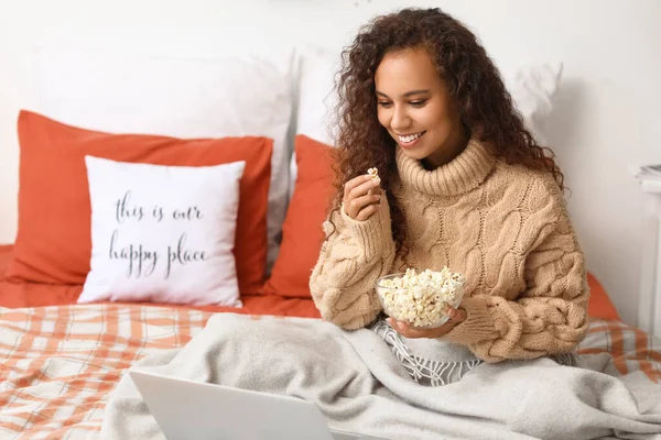 Young African American Woman Popcorn Watching Movie Bedroom Christmas Eve — Stock Photo, Image