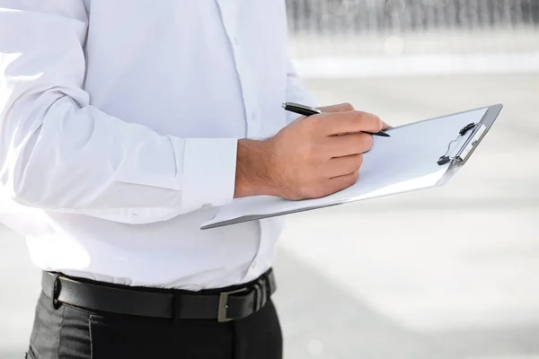 Stylish Businessman Writing Clipboard City Square — Stock Photo, Image