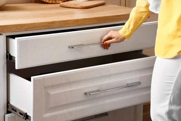 Young Woman Opening Kitchen Drawer Closeup — Stock Photo, Image