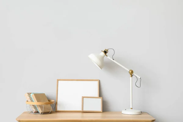 Table White Lamp Books Frames Light Wall — 图库照片