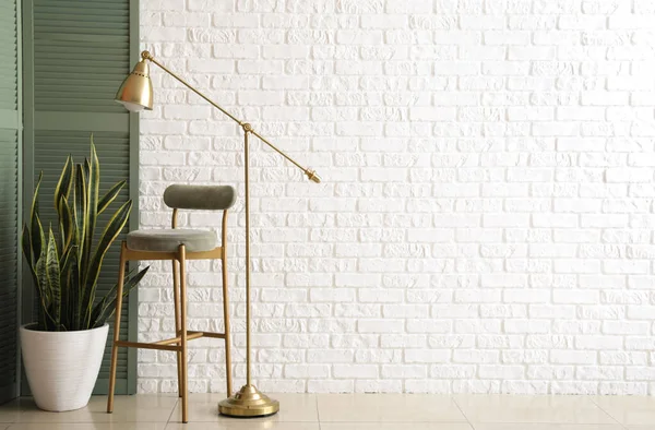 Golden Standing Lamp Chair Houseplant Folding Screen White Brick Wall — Stock Photo, Image