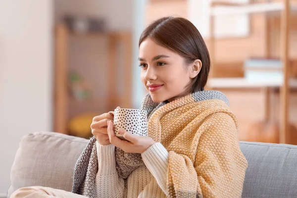 Beautiful Young Woman Drinking Tasty Tea Sofa Home — Stock Photo, Image