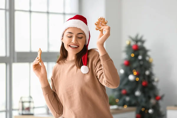 Happy Young Woman Santa Hat Gingerbread Cookies Home — Stock Photo, Image