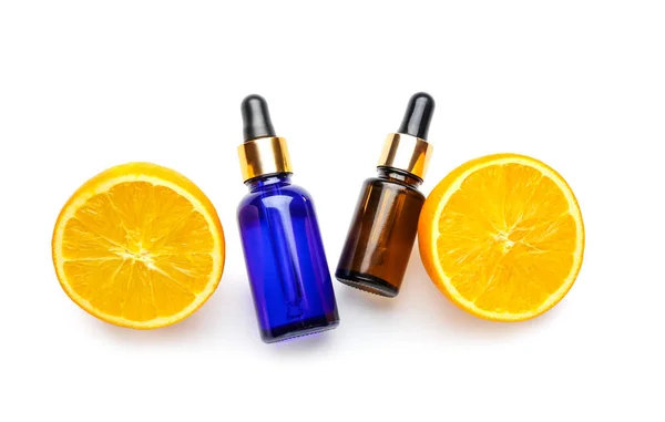 Bottles Essential Oil Fresh Cut Orange White Background — Stock Photo, Image