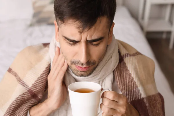 Ill Young Man Sore Throat Drinking Hot Tea Home — Stock Photo, Image