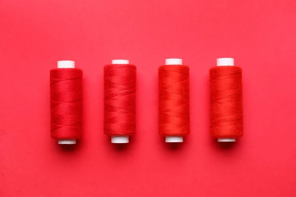 Sewing Threads Red Background — Stock Photo, Image
