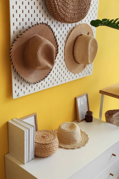 Pegboard Stylish Hats Hanging Yellow Wall — Stock Photo, Image