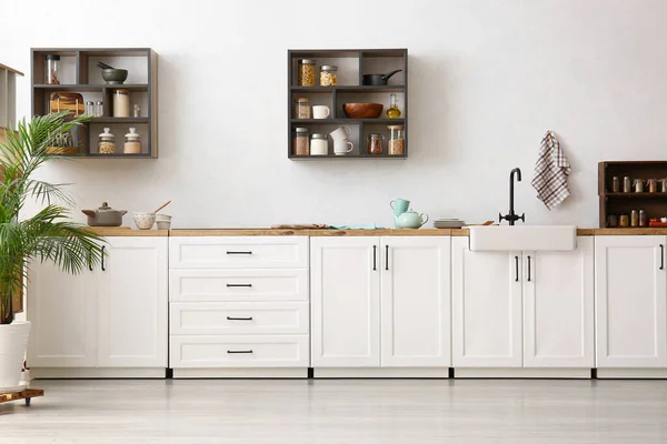 Interior Light Modern Kitchen White Counters Shelves Supplies — Stock Photo, Image