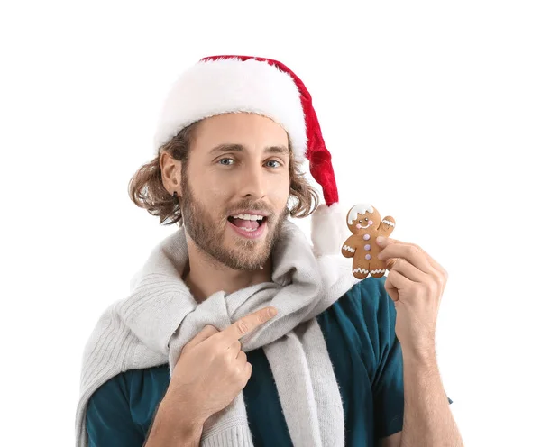 Young Man Santa Hat Pointing Gingerbread Cookie White Background — Stock Photo, Image