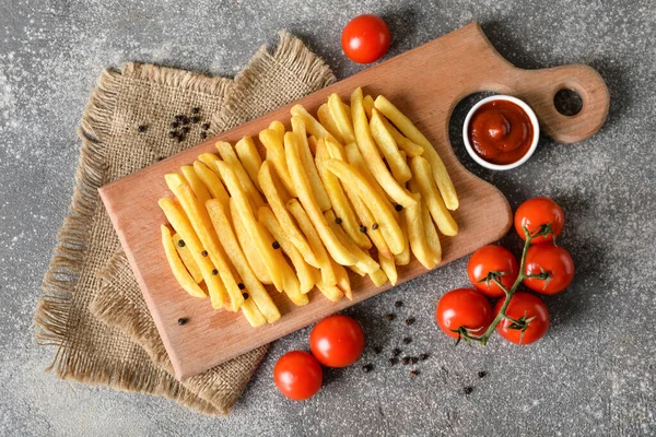 Wooden Board Tasty French Fries Ketchup Grey Background — Stock Photo, Image