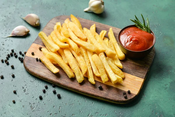 Wooden Board Tasty French Fries Ketchup Green Background — Stock Photo, Image