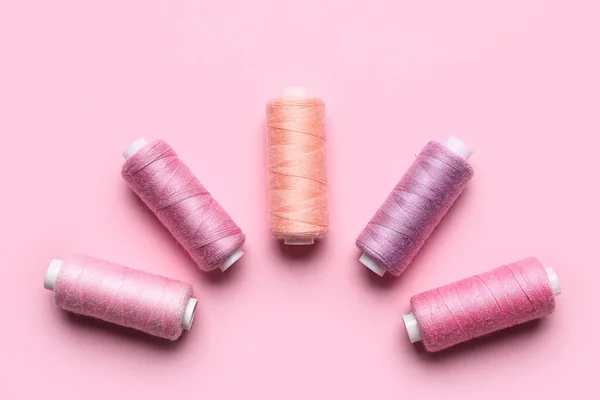 Different Sewing Threads Pink Background — Stock Photo, Image