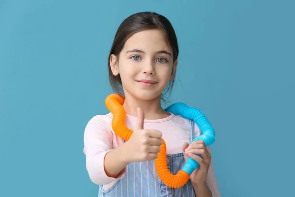 Happy Little Girl Pop Tubes Blue Background — Stock Photo, Image