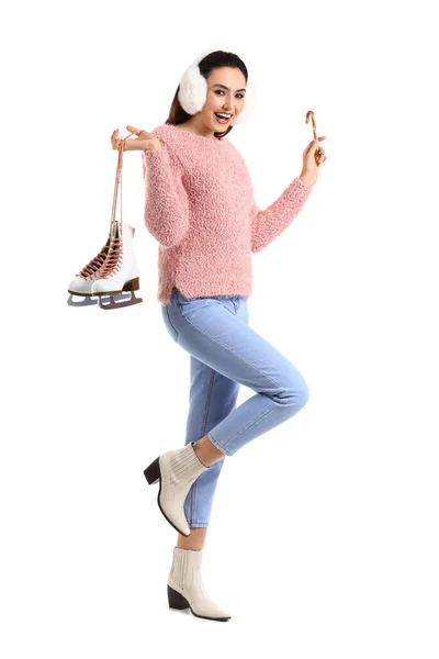 Young Woman Earmuffs Ice Skates Candy Cane White Background — Stock Photo, Image