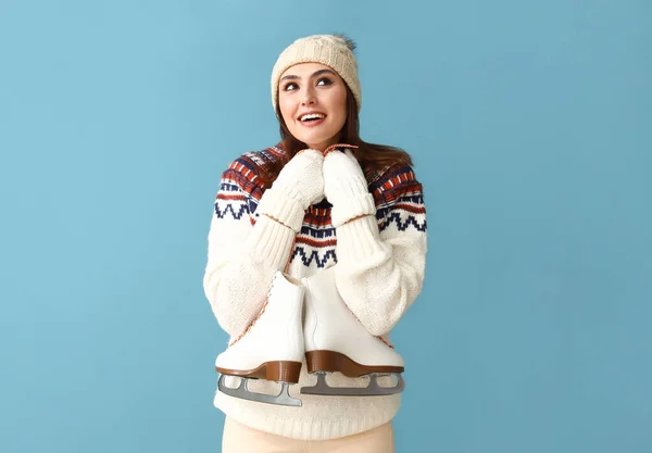 Dreaming Young Woman Warm Clothes Ice Skates Blue Background — Stock Photo, Image